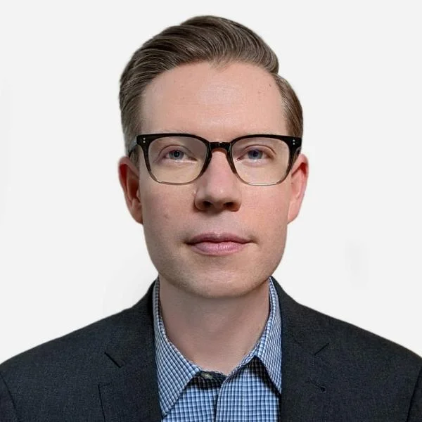 Headshot of Andrew North