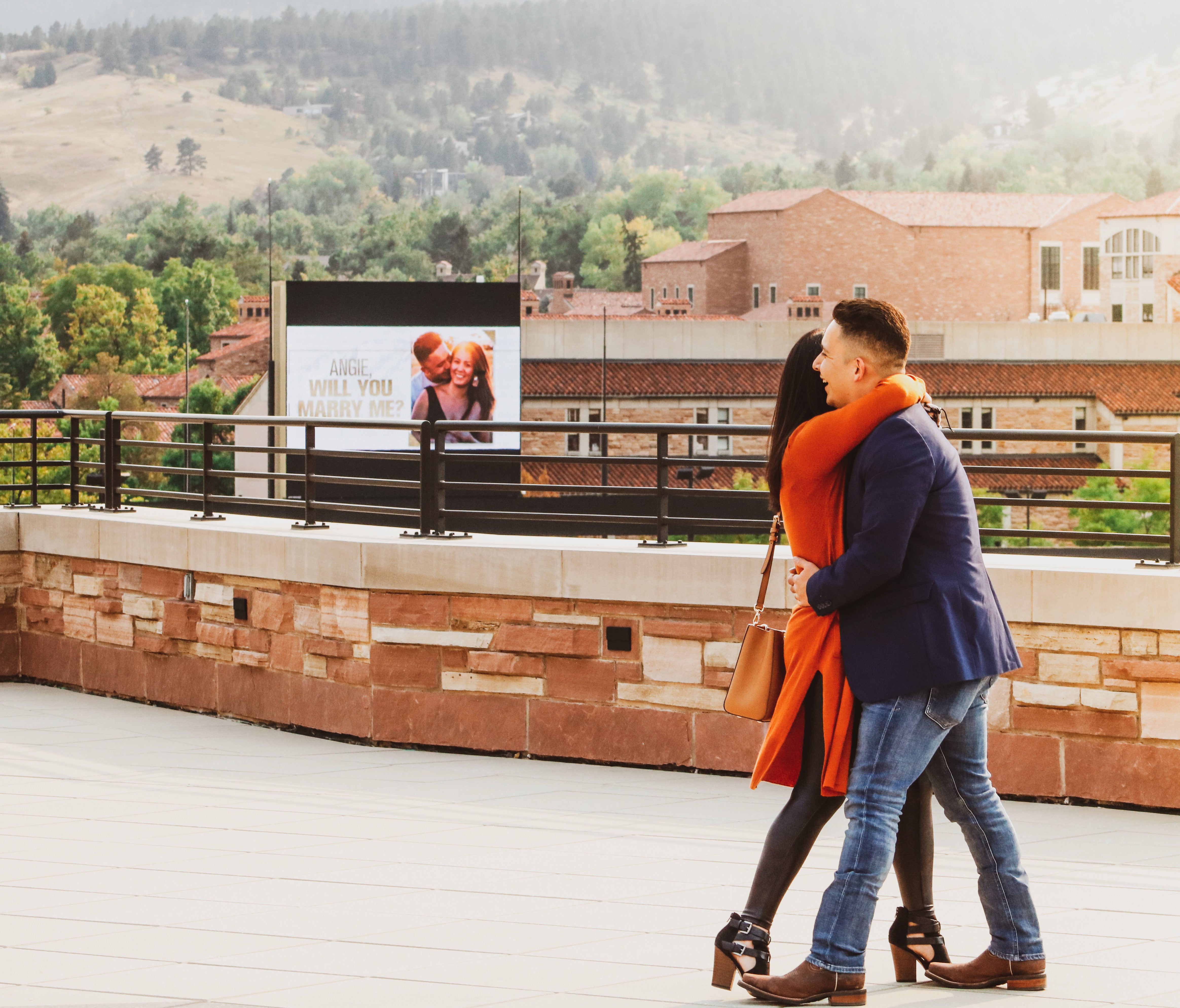 The Lopez's marriage proposal at Folsom Field