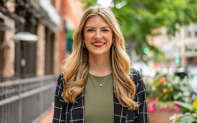 Allie Williams smiles in a garden in Denver.