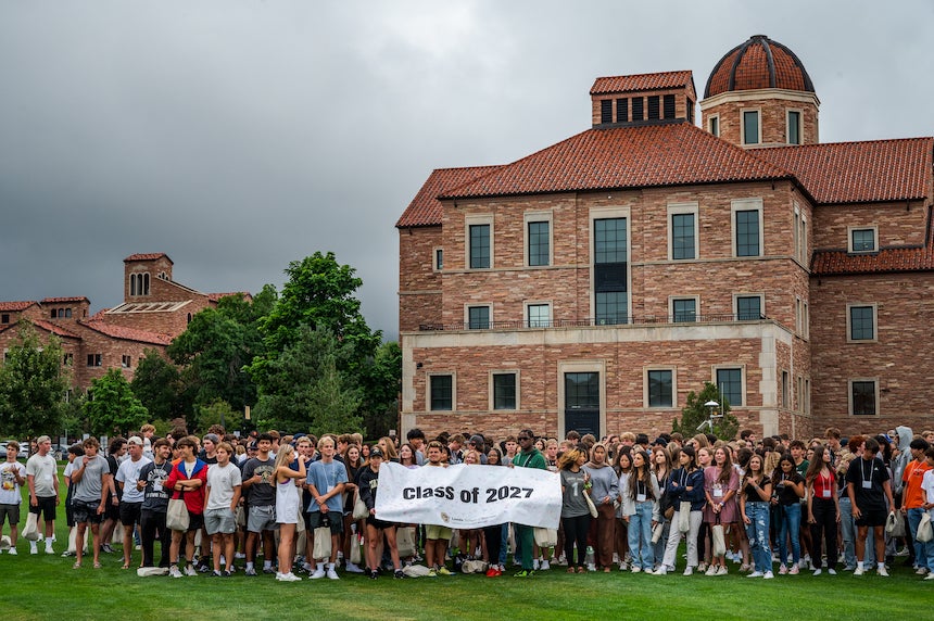 Images of Leeds School of Business Class of 2027 in front of the Koelbel Building