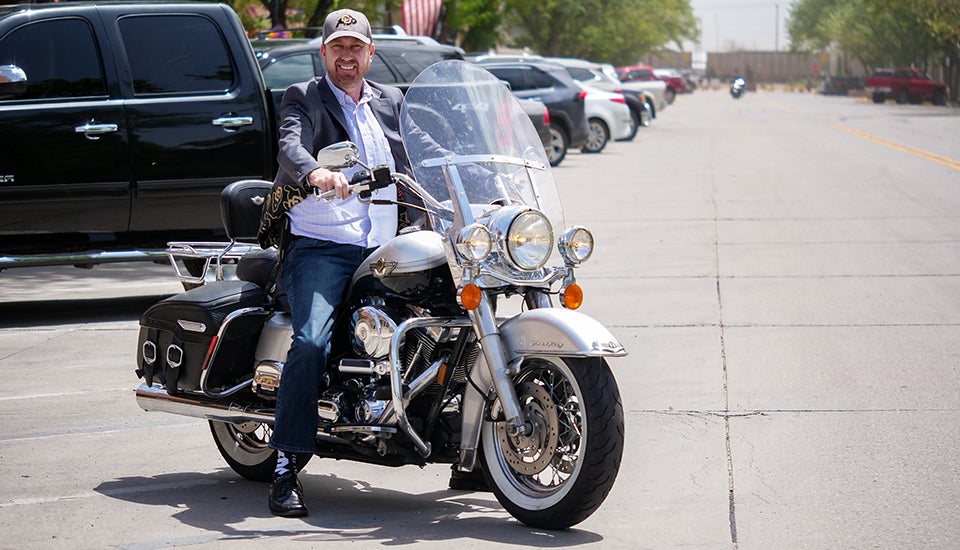 Erick Mueller on his motorcycle on the streets of downtown Stirling. 