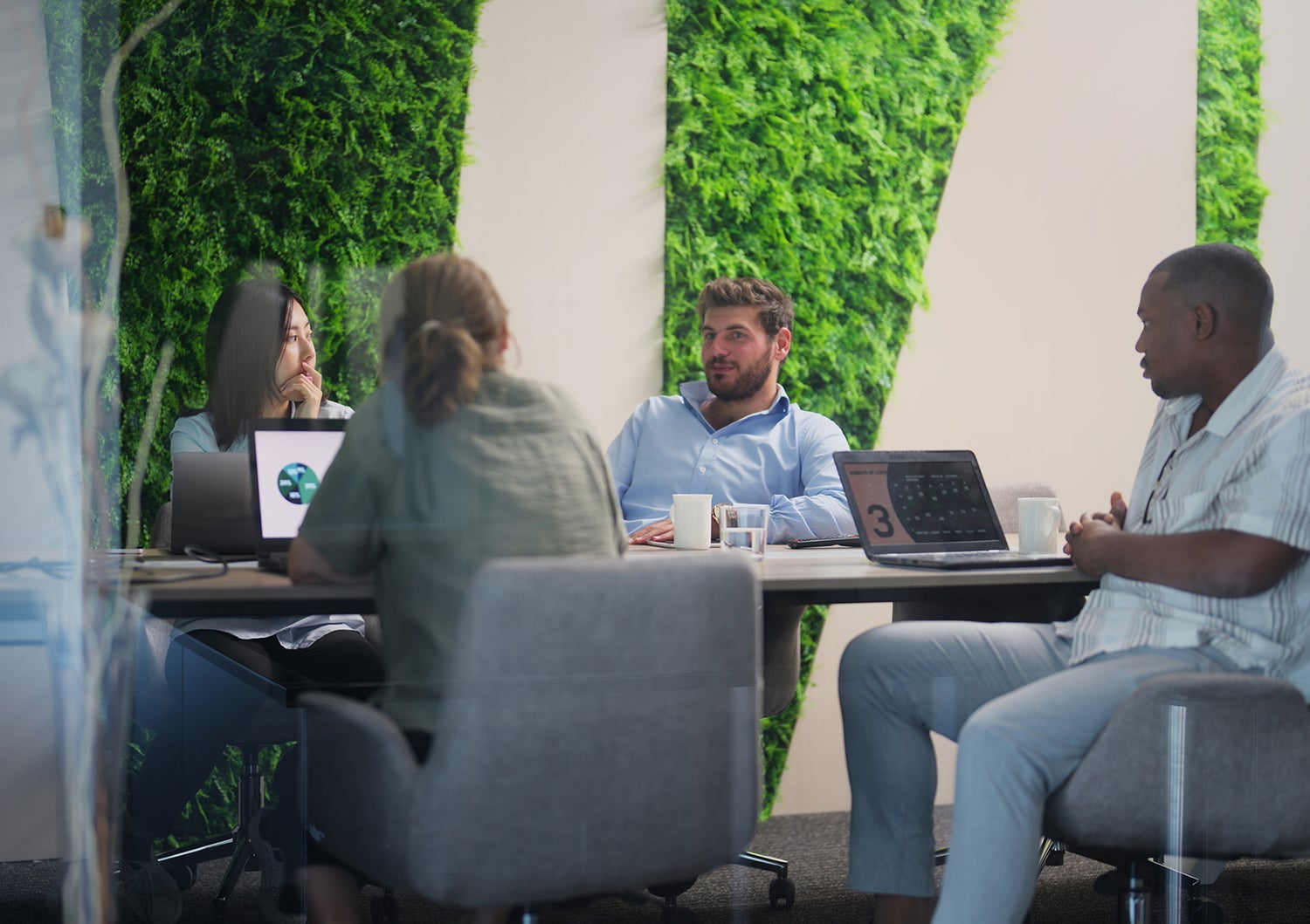 Photo of group of people working together