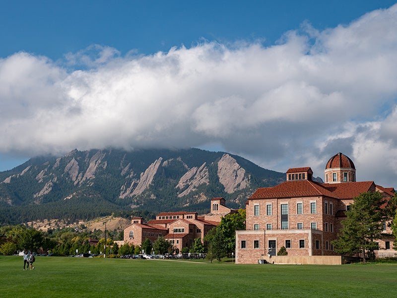 The Koelbel Building with the Flatirons in the background