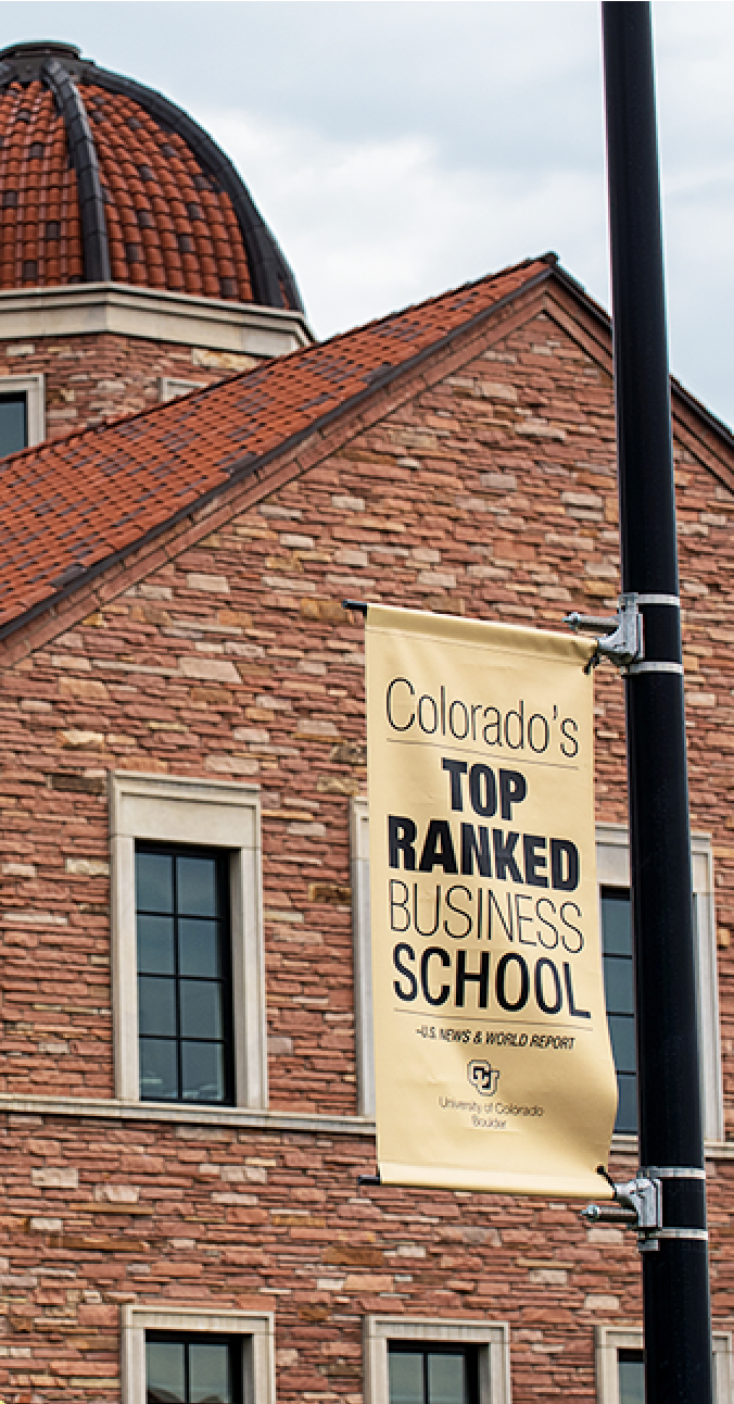 photo of Koelbel with banner that reads "Colorado's Top Ranked Business School"