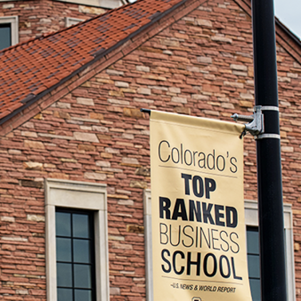 photo of Koelbel with banner that reads "Colorado's Top Ranked Business School"