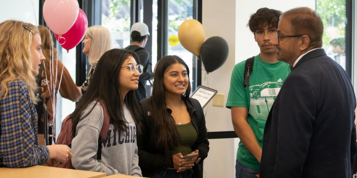 Dean with students