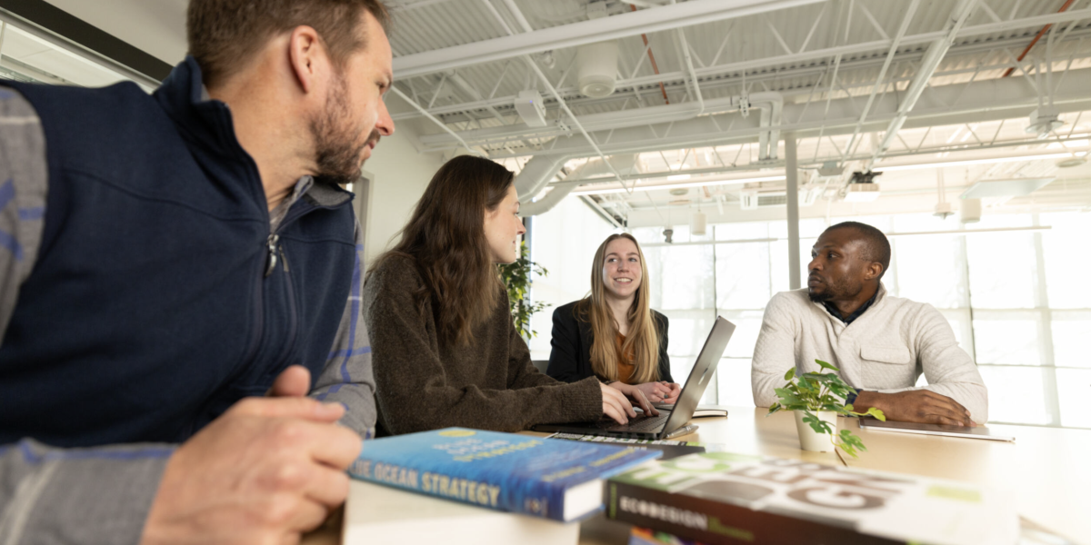 Students Discussing Business Sustainability