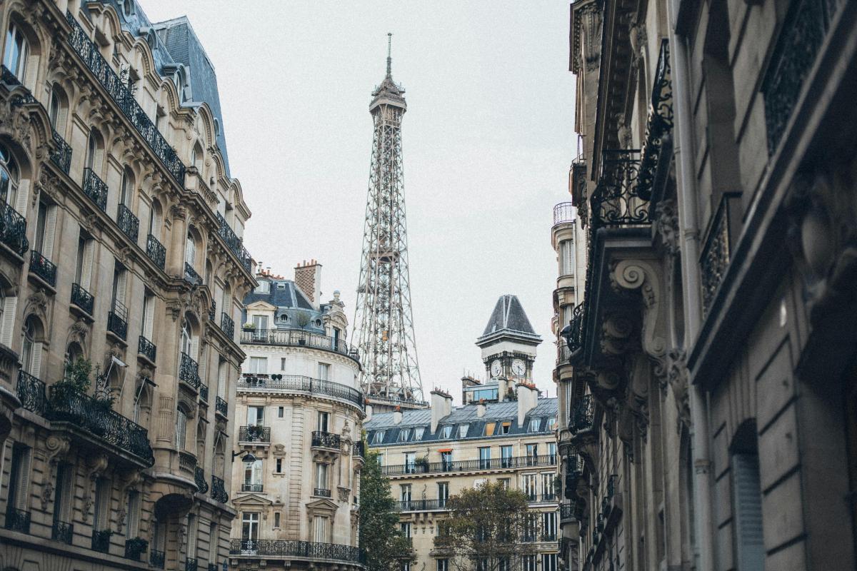 A Paris neighborhood with the Eiffel Tower in the distance