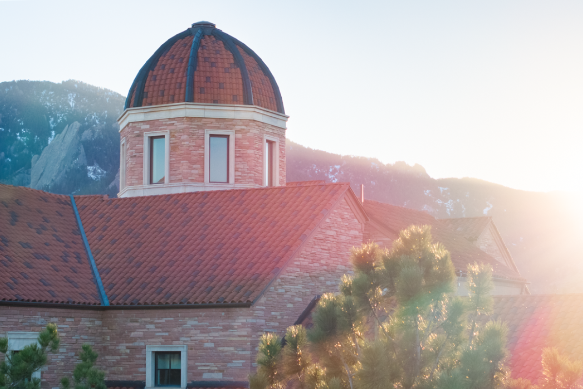 Image of the dome atop the Koelbel building housing Leeds during sunset