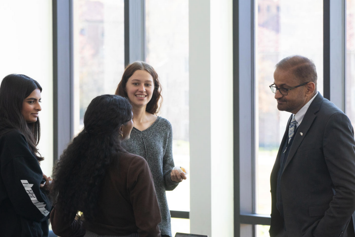 Dean Khatri with students