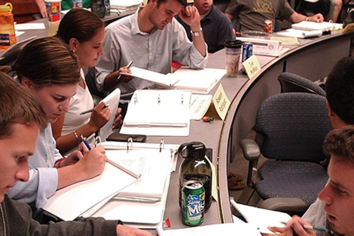Undergraduate Curriculum showing business students studying