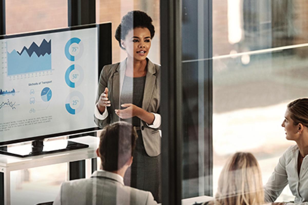 A woman presenting information