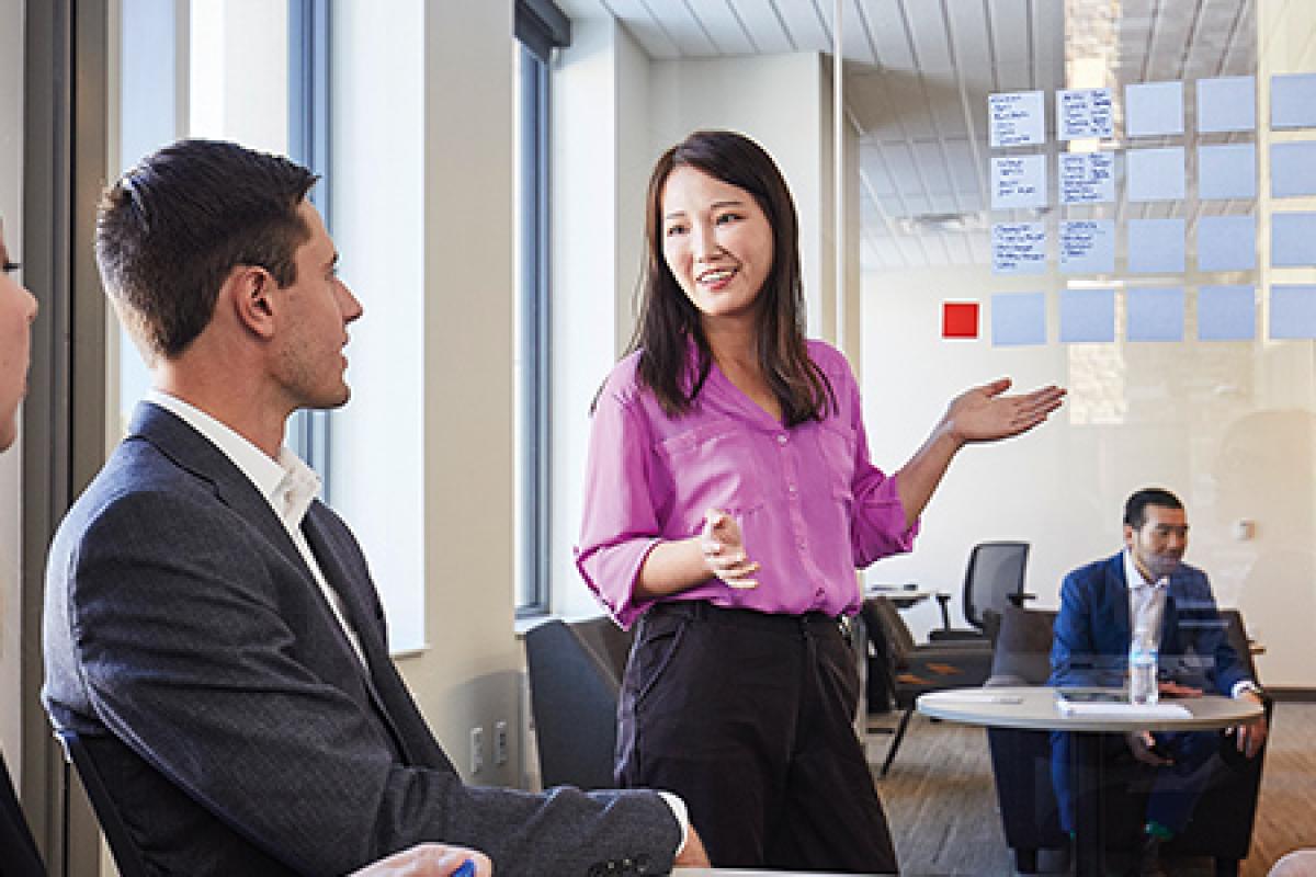 High growth ventures professionals and a faculty member in a discussion