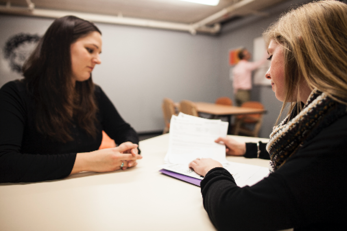 Pre-business student meeting with an advisor