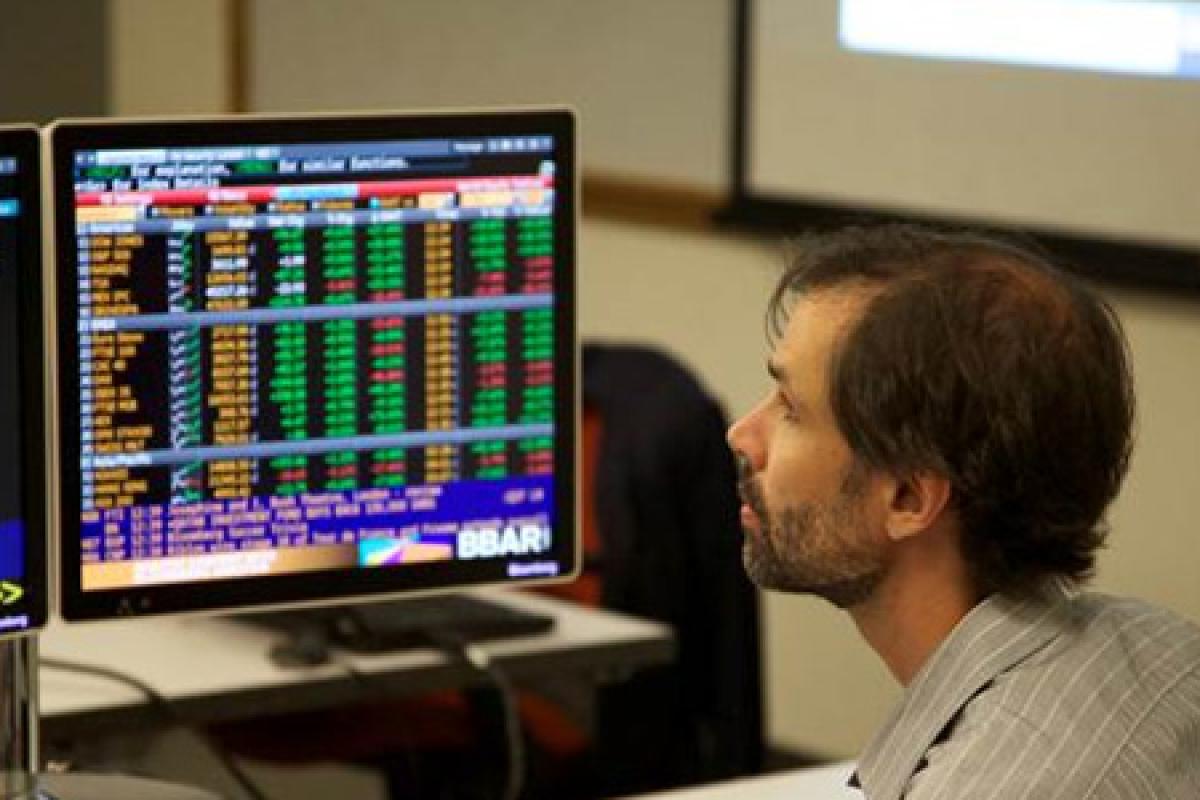 Student using a Bloomberg Terminal in the Bloomberg Lab located at the Burridge Center