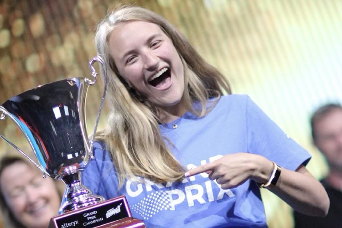 Claire McCollough holds her winning trophy at the Grand Prix.