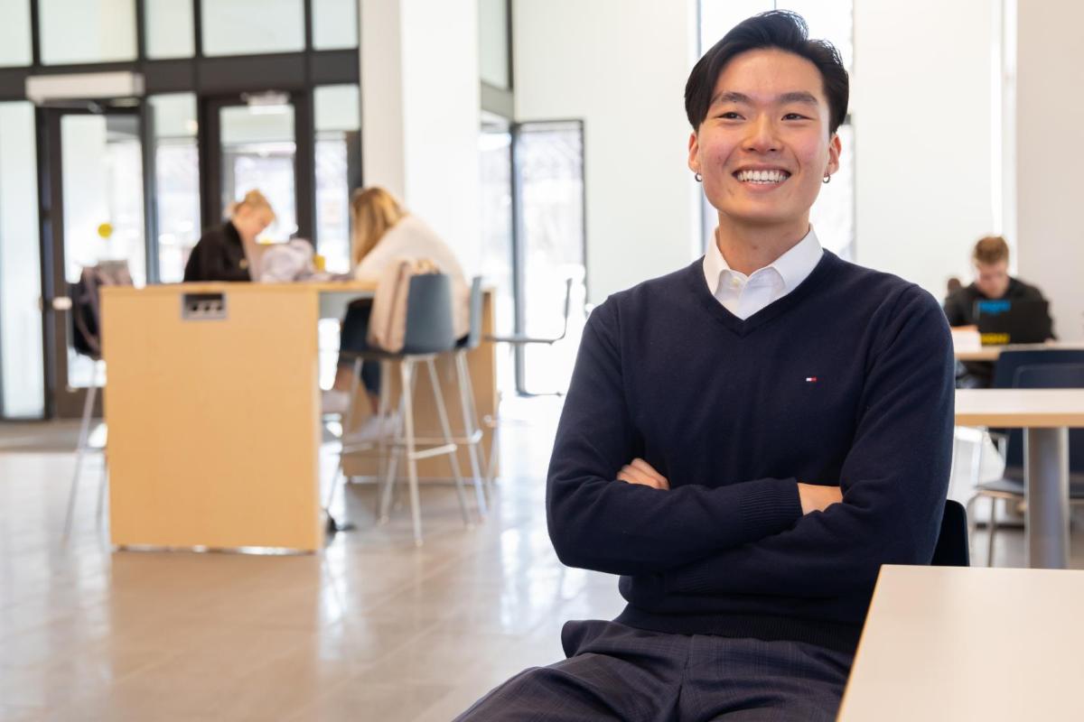 Will Xu in a conference space.