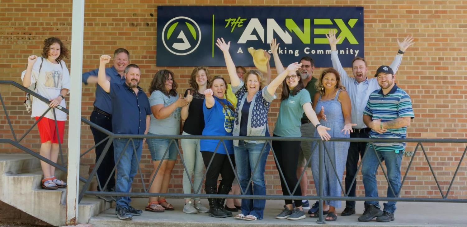 RCWS participants standing in front of The Annex sign