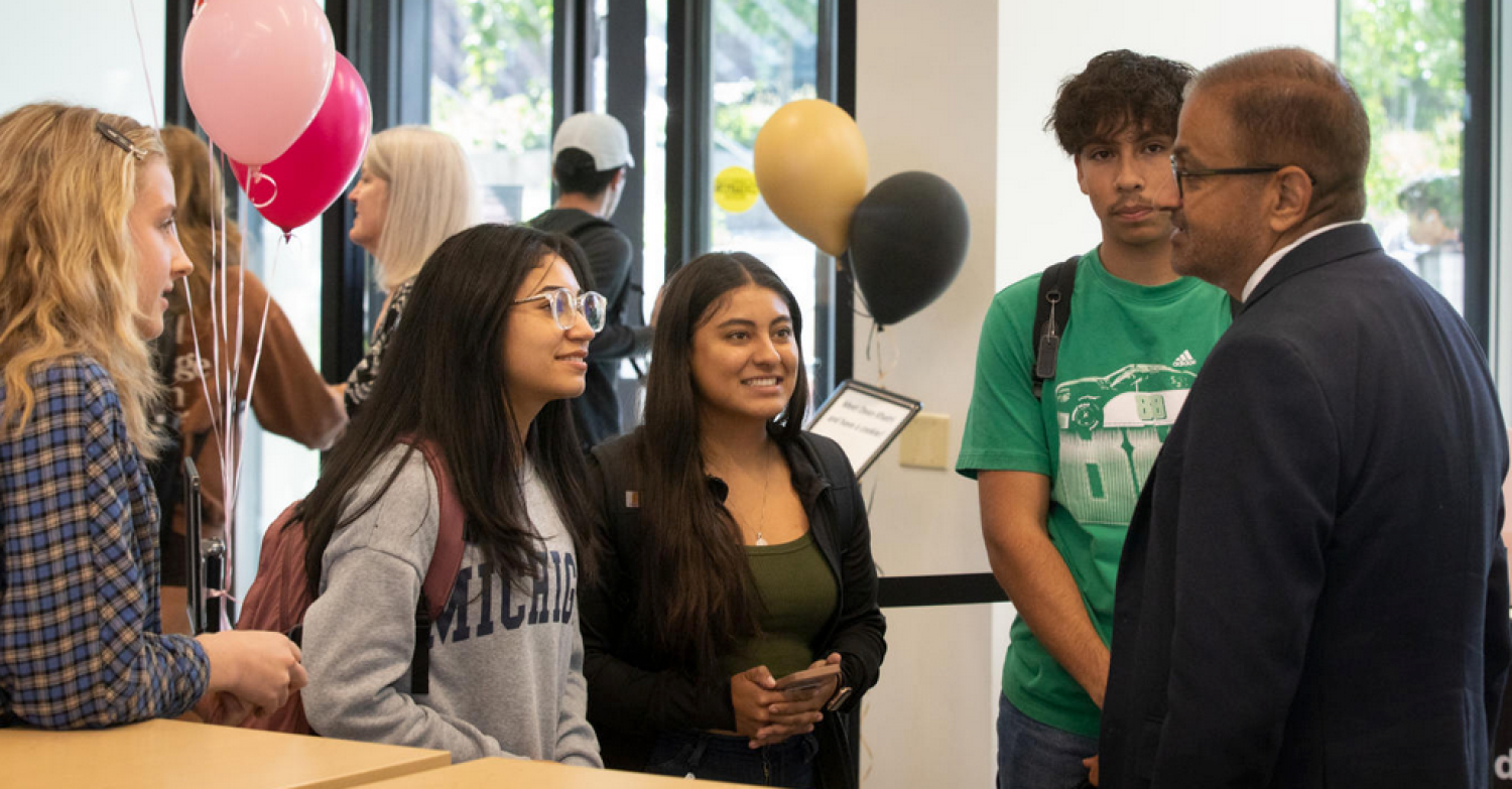 Dean with students
