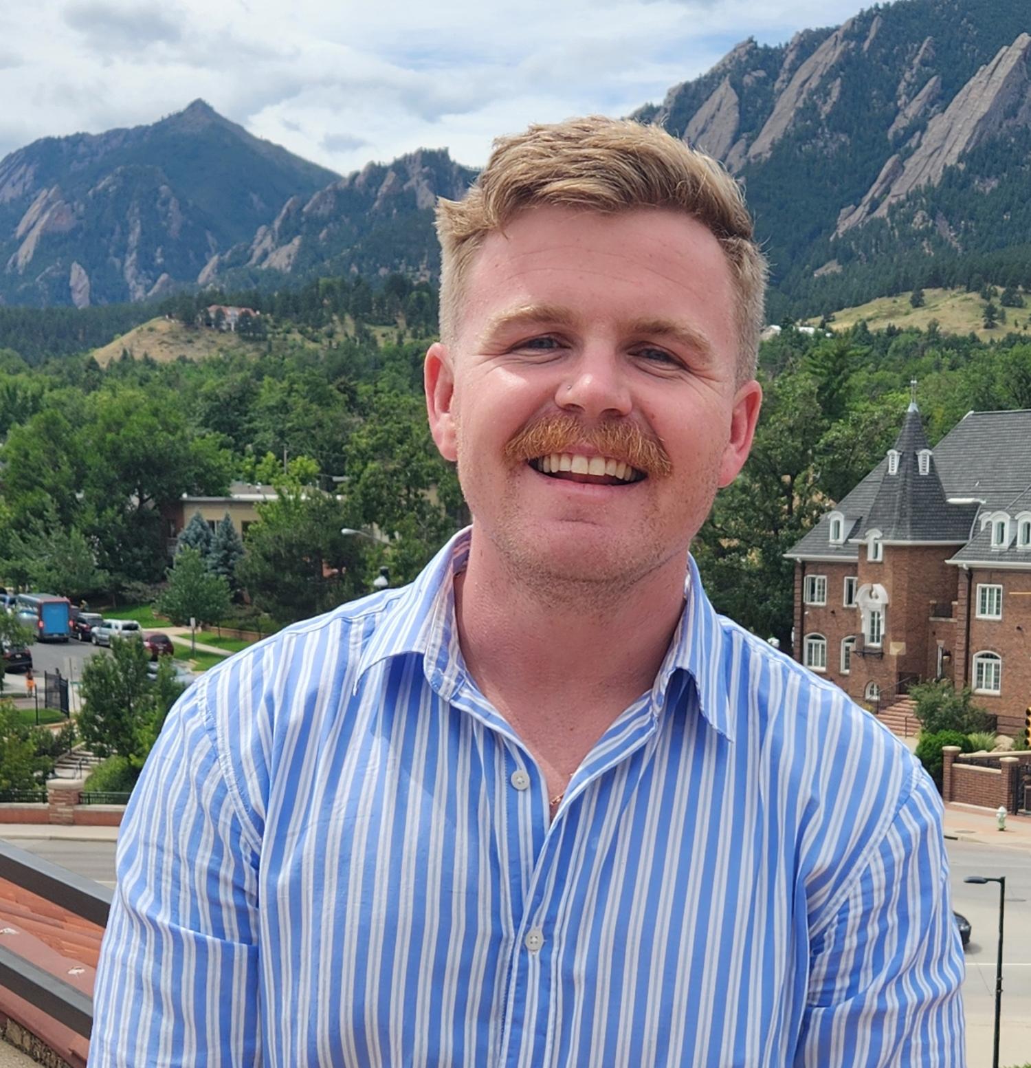 James Anderson photo in front of the Boulder Flatirons