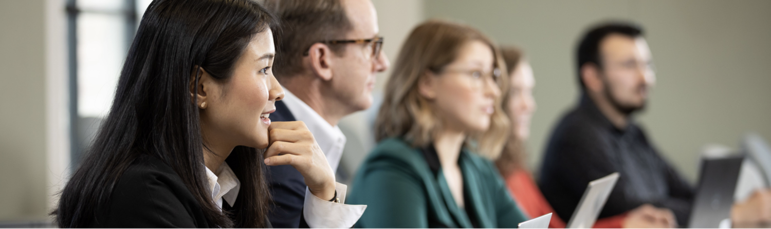Students speak in a classroom