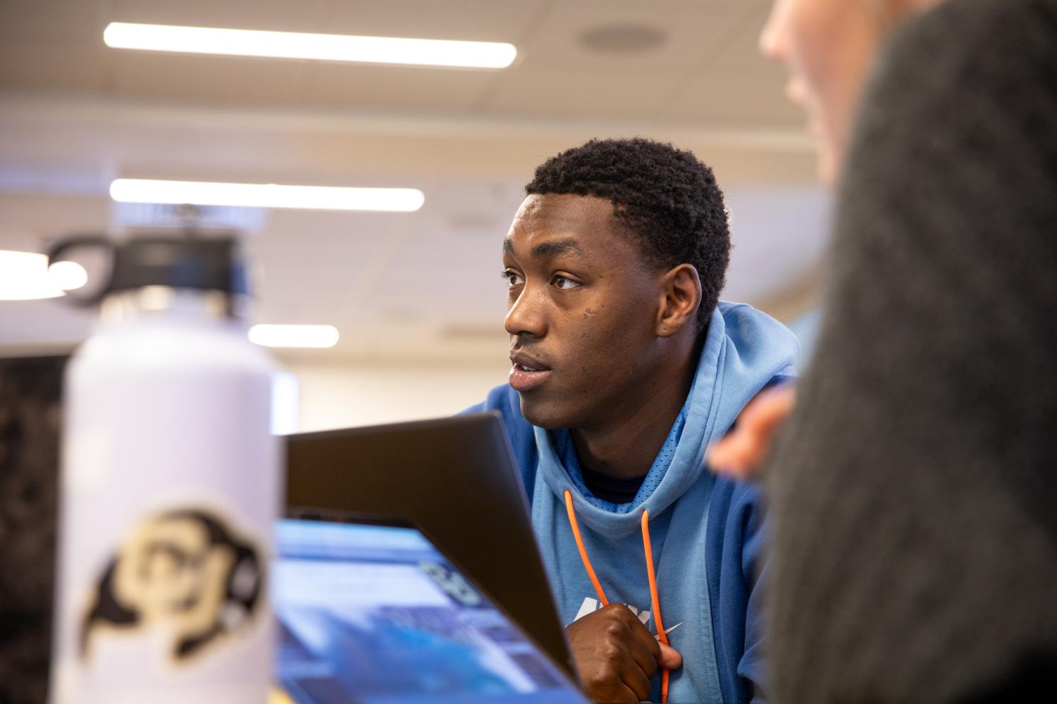Closeup of a student in a classroom