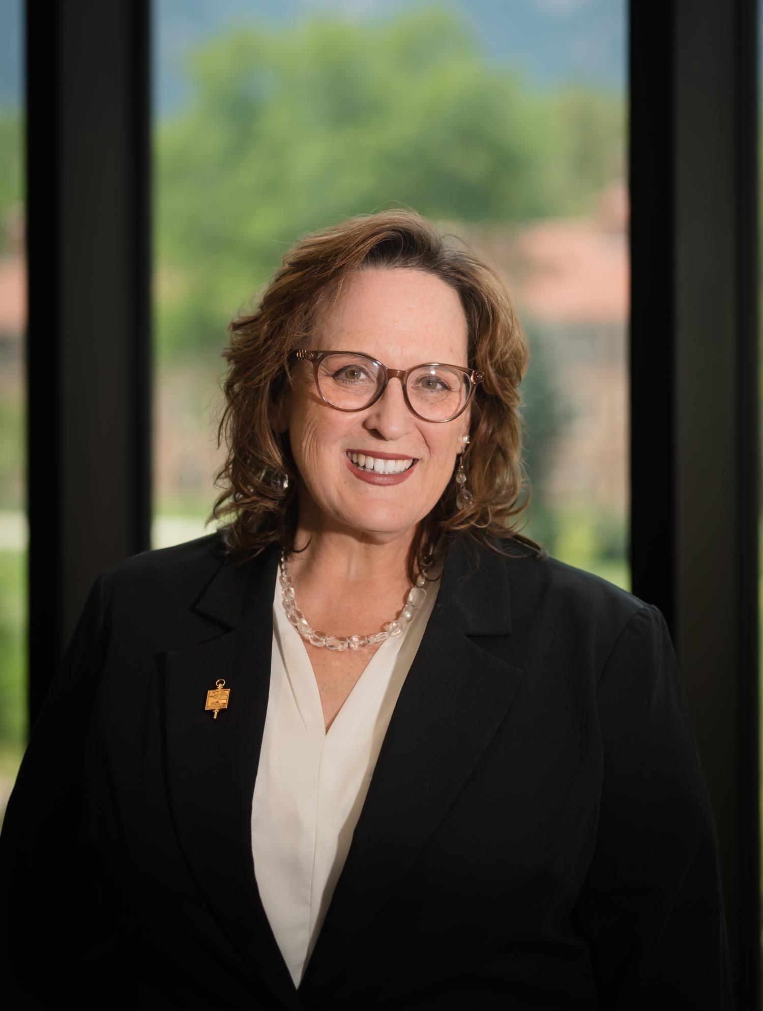 Ellie Gates, Faculty