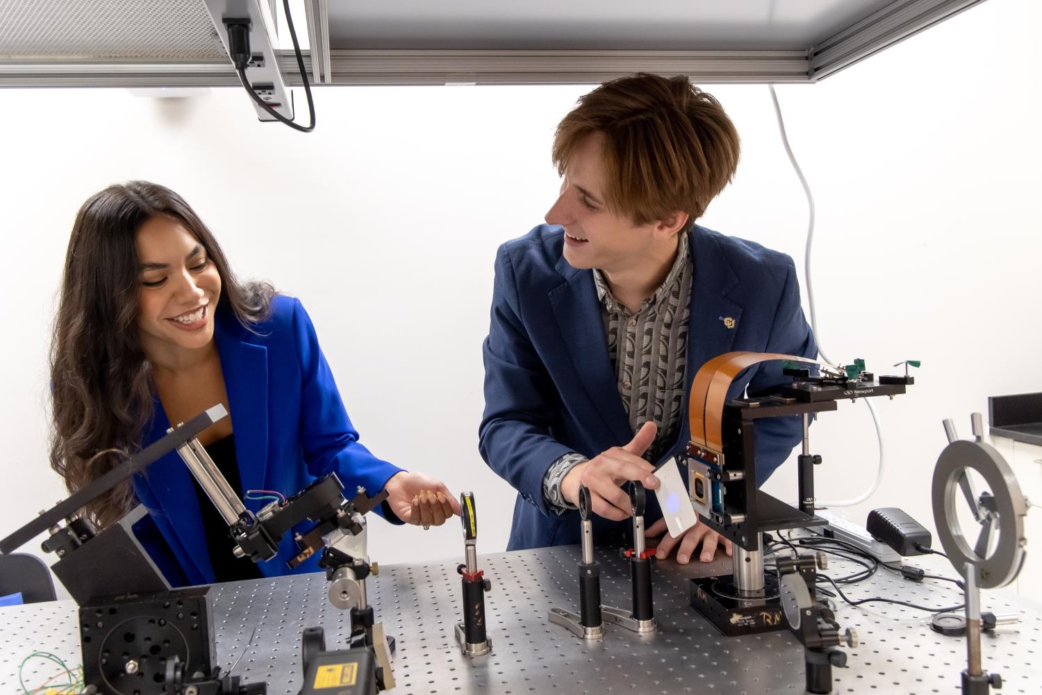Two students working on an engineering project