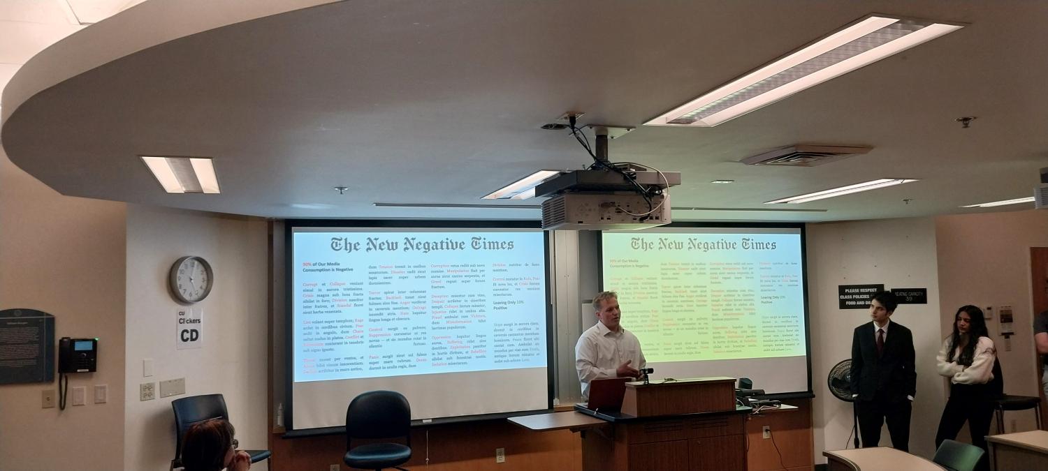 Charlie Tell presenting a writing project in Bonnie Auslander's class