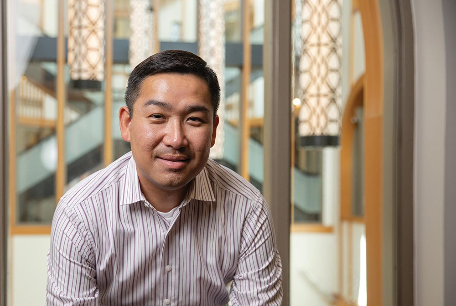 Tony Kong stares intently at the camera.