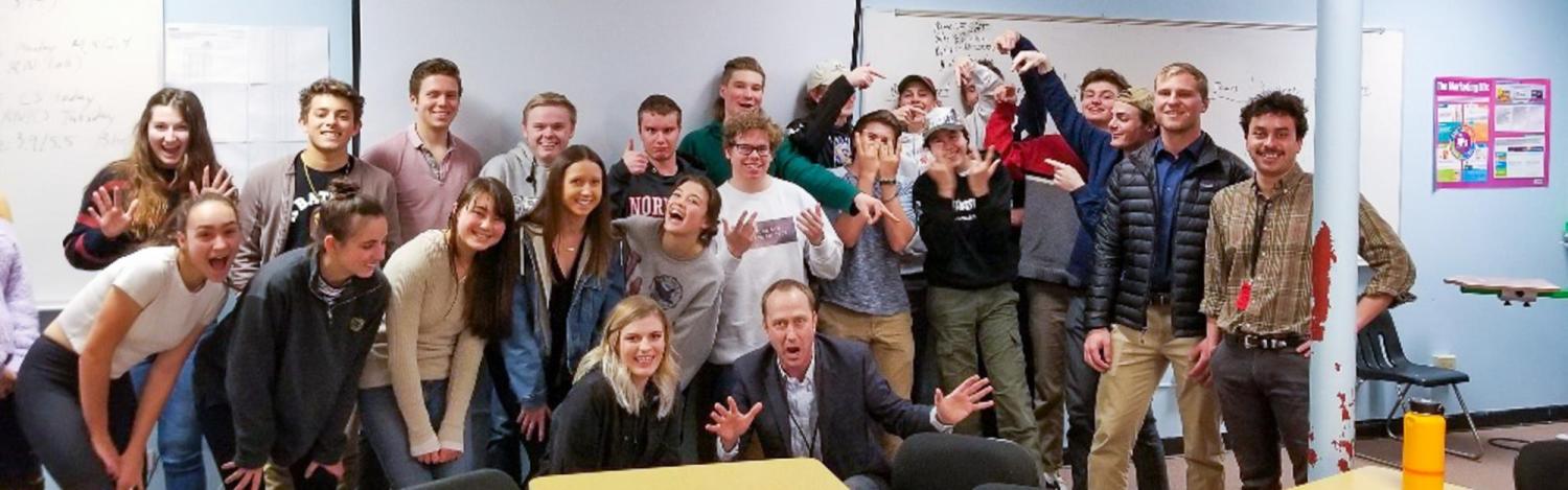 Erick Mueller with a group of 20 students and two high school staff during 2019 $5 Challenge