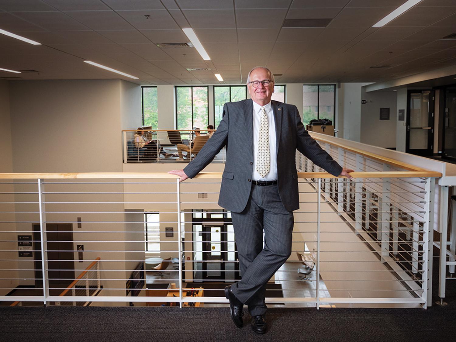 Don Oest poses in the Rustandy Building.