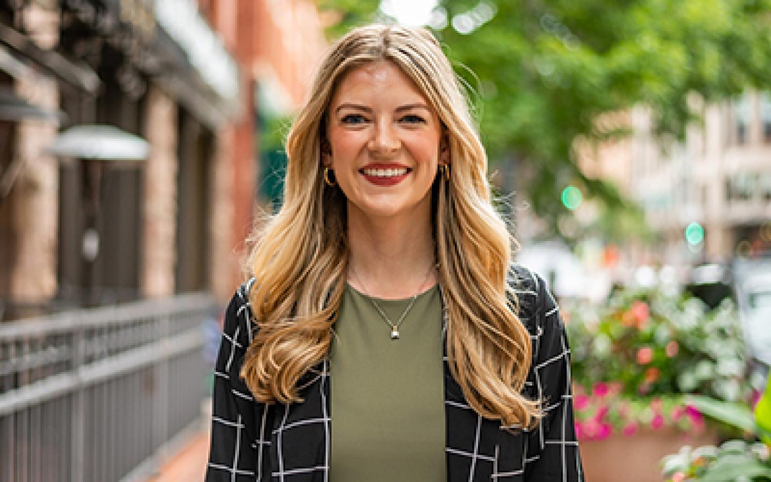 Allie Williams smiles in a garden in Denver.