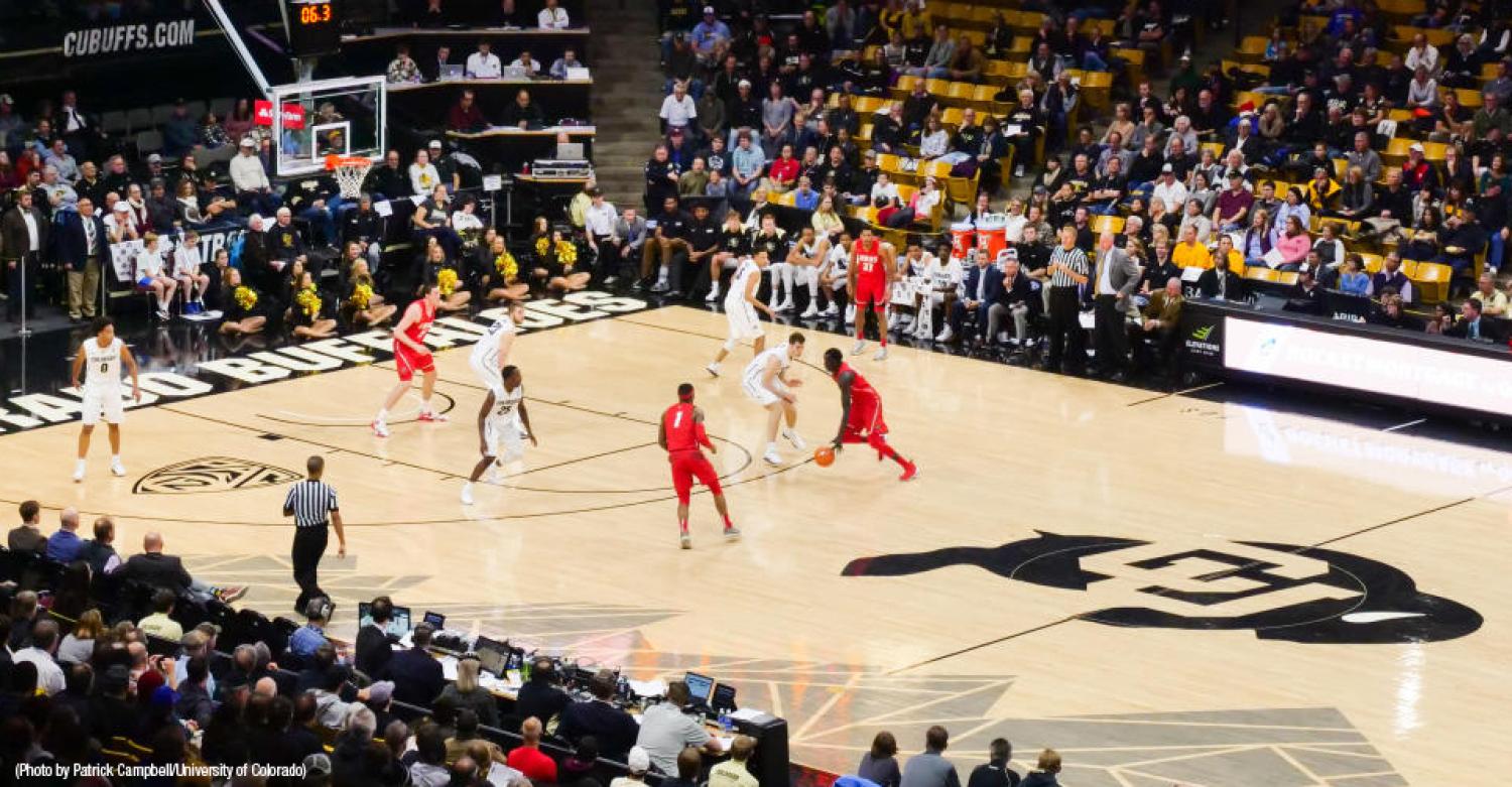 CU buffs basketball team on Coors Event center court playing UNM