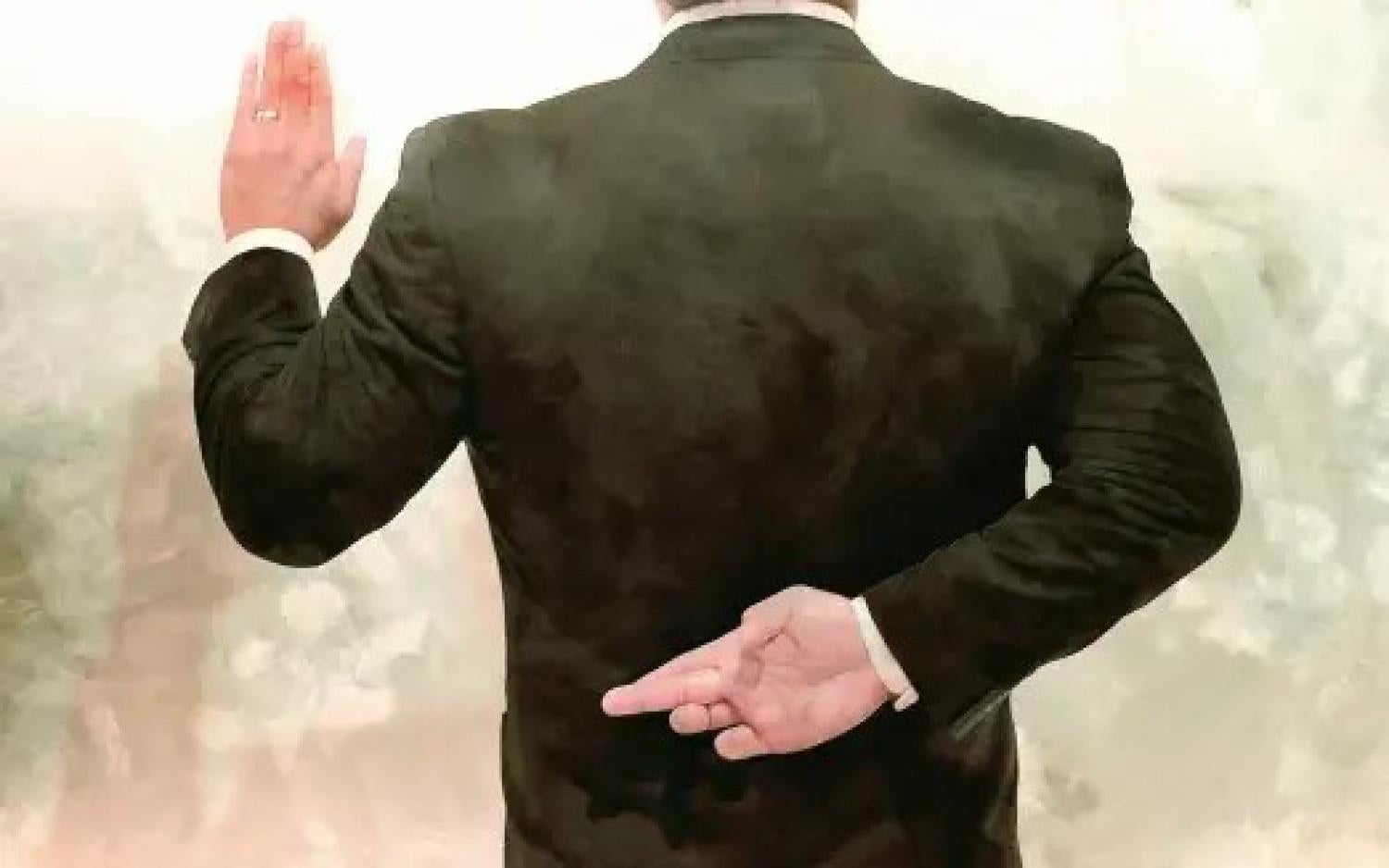Ethics of Negotiation image of man crossing fingers