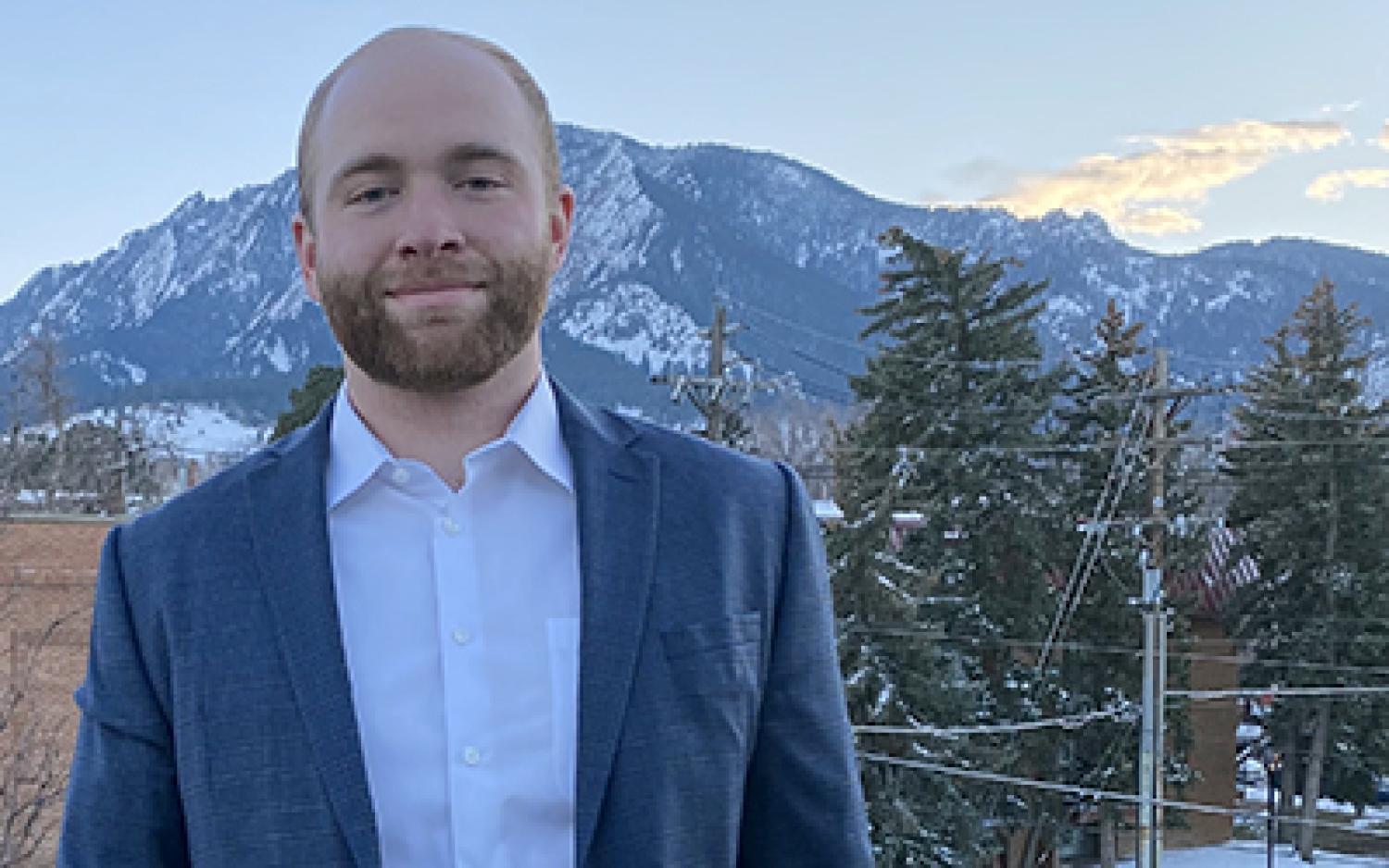 Ryan Adzima, with the mountains in the backdrop.