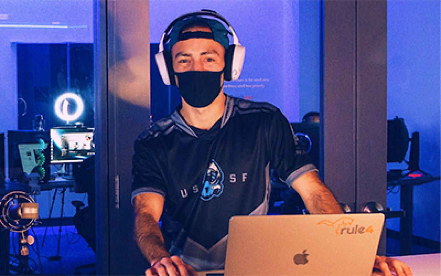 Zach Baumann competing in a video game competition.