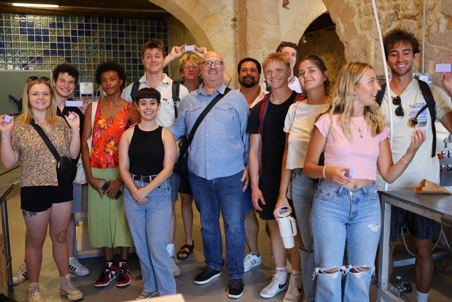 Joe Constancia standing with his classmates and professor on the Global Seminar: New Venture Creation & Internship trip.