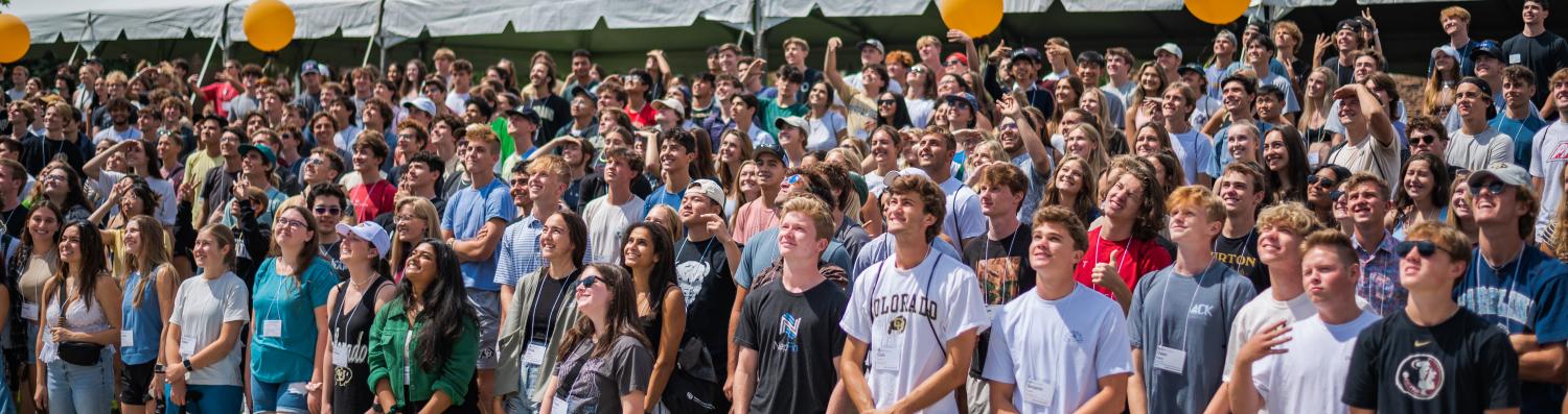 A group of first-year students posing for a class photo.
