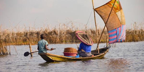 People working in a boat in Benin