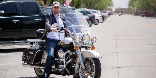 Erick Mueller on his motorcycle on the streets of downtown Stirling. 