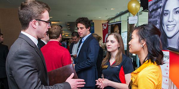 Leeds Student at a career fair with alumni