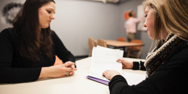 Pre-business student meeting with an advisor