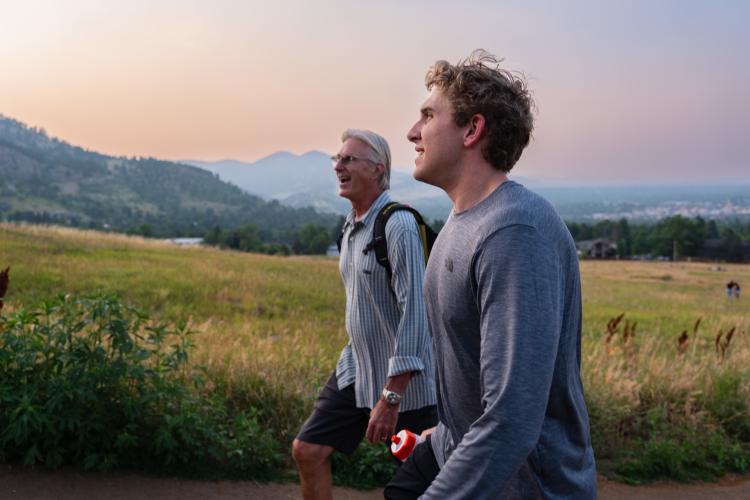 Martin Moller and Nolan Crowley connect on a hike at Chautauqua Park.