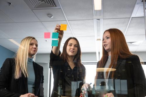 MBA Students at board