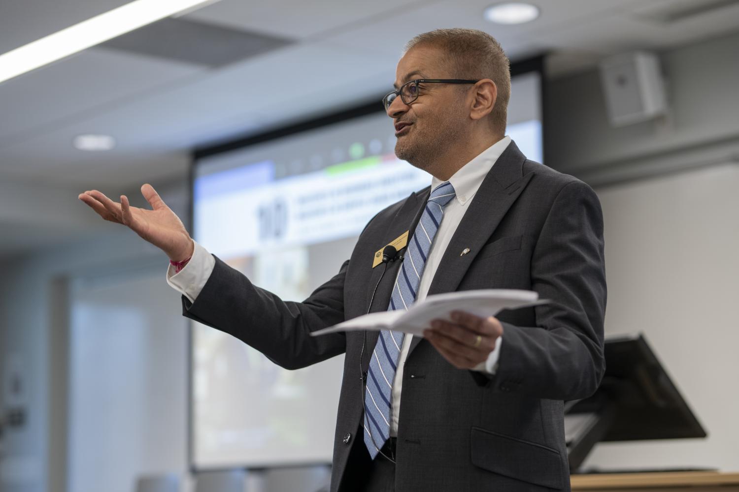 Vijay Khatri speaks to a group