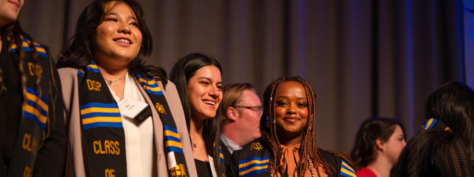 2022 Diverse Scholar Graduates on stage at academic awards banquet