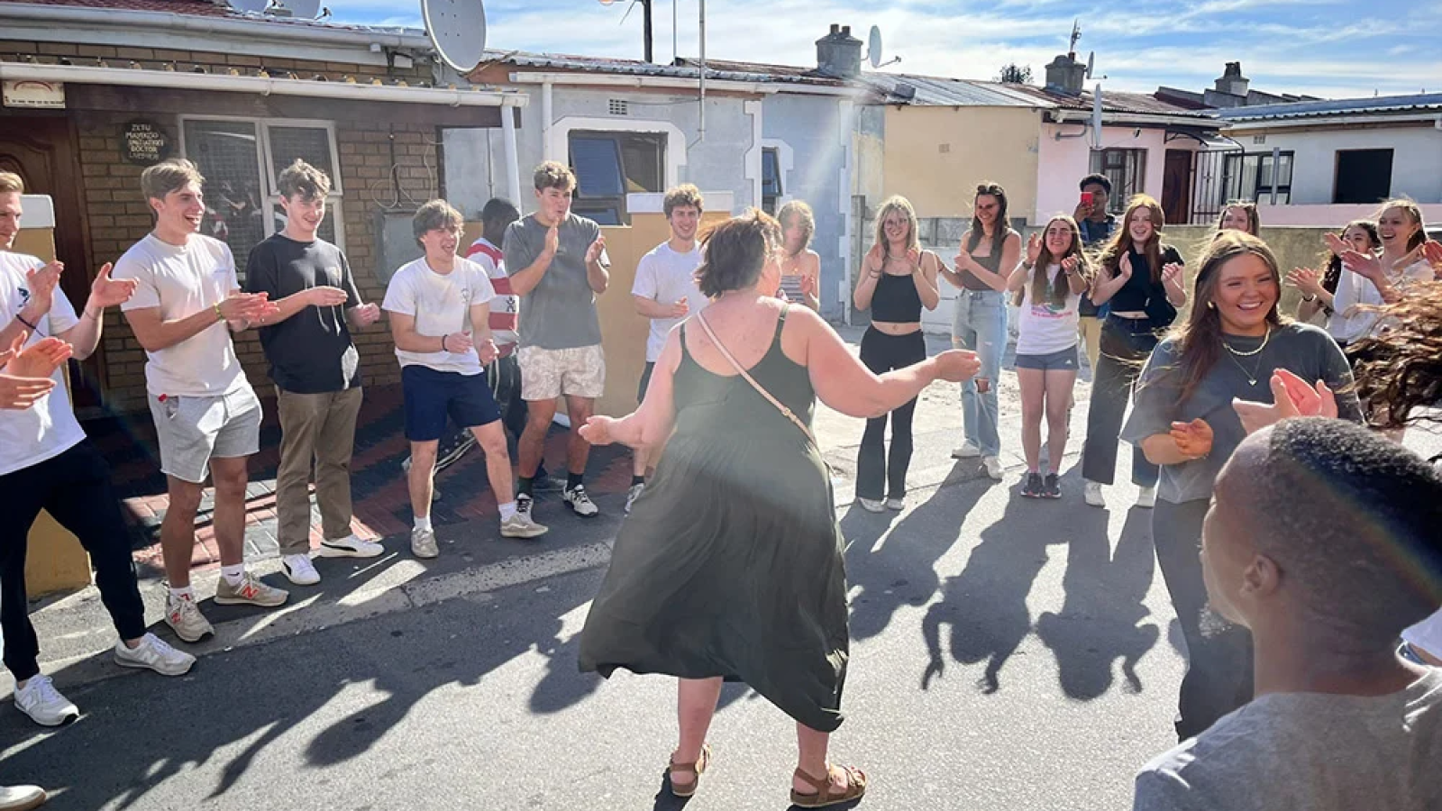 Students dance during an FGX trip to South Africa
