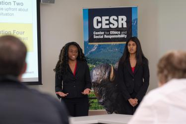 Business Ethics Case Competition team presenting in person