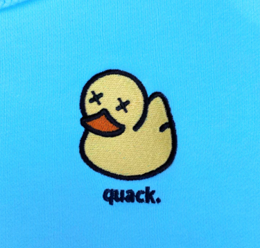 DumbClub's signature duck embroidered on a hoodie